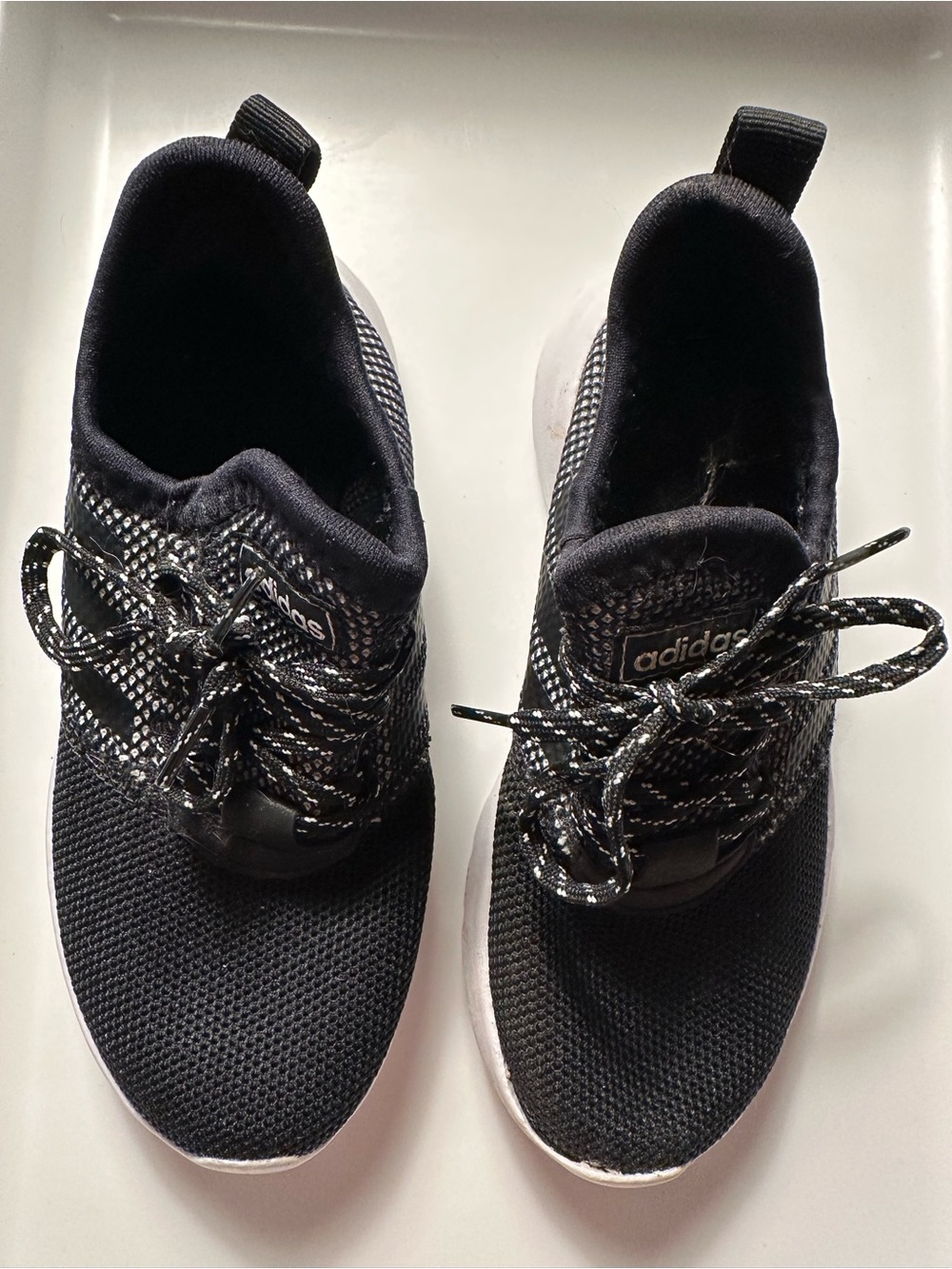 adidas Black and White Knit Slip-On Sneakers